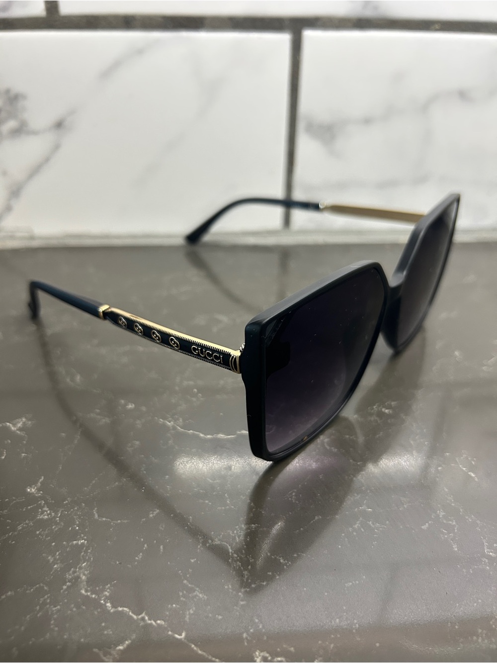 Gucci Black Sunglasses with Gold-Trim Temples